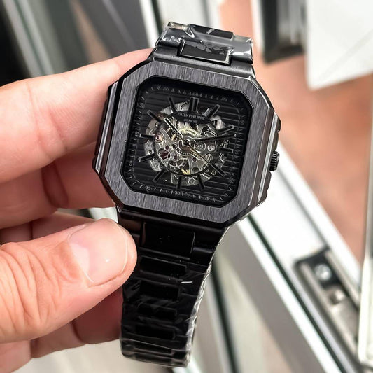 black-toned Patek Philippe automatic skeleton watch.