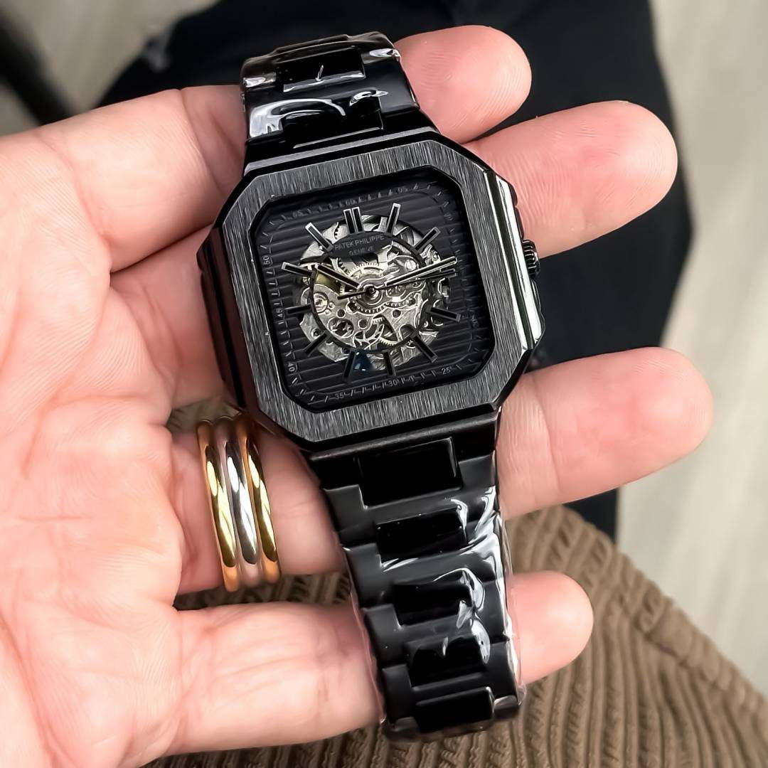 black-toned Patek Philippe automatic skeleton watch.