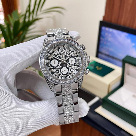 Rolex Daytona "Eye of the Tiger" watch in a silver-tone case and bracelet with a diamond-set bezel and an intricate black and silver dial.