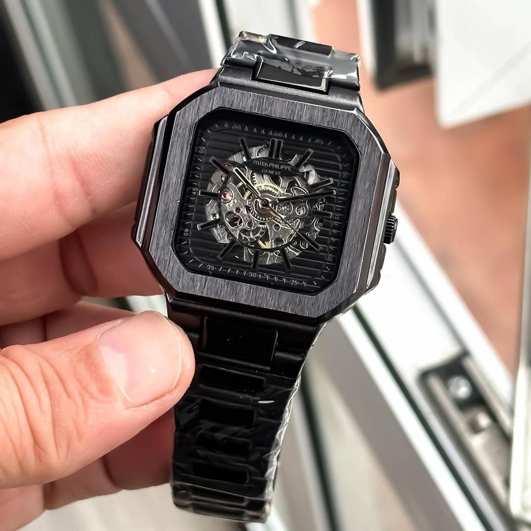 black-toned Patek Philippe automatic skeleton watch.